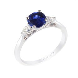 round-sapphire-and-diamond-ring
