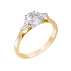 oval diamond 3-stone ring with pear cuts