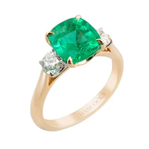 cushion cut emerald 3 stone engagement ring