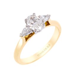 oval cut diamond three stone ring