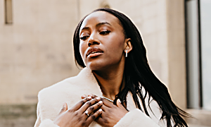 lady wearing diamond earrings