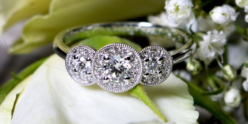 3-211-diamond-cluster-three-stone-ring